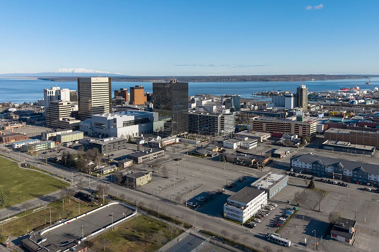 Downtown Anchorage skyline with water and mountains in the distance